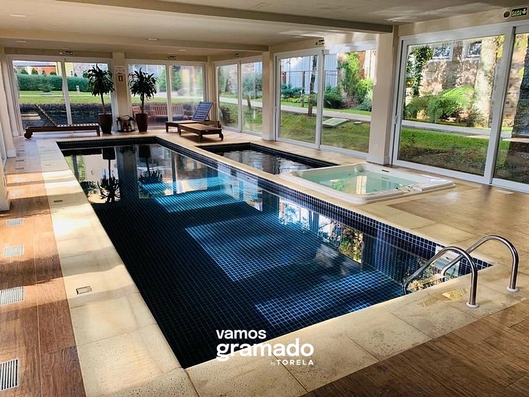 Casa de Pedra 303A - 2 suítes com piscina Gramado